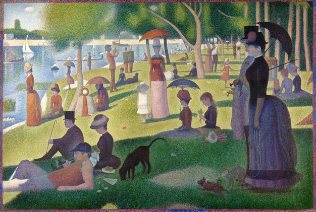 Painting. Men, women, and children stand, stroll, sit, or recline along a green riverbank. The painting was created using tiny dots of saturated colour, giving it a soft, hazy look. The women and children stand and sit primly upright. One man, close to us, leans back on his elbows.